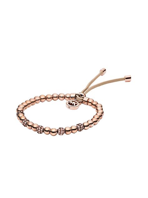 michael kors rose gold tone beaded stretch bracelet|Michael Kors rose gold satchel.